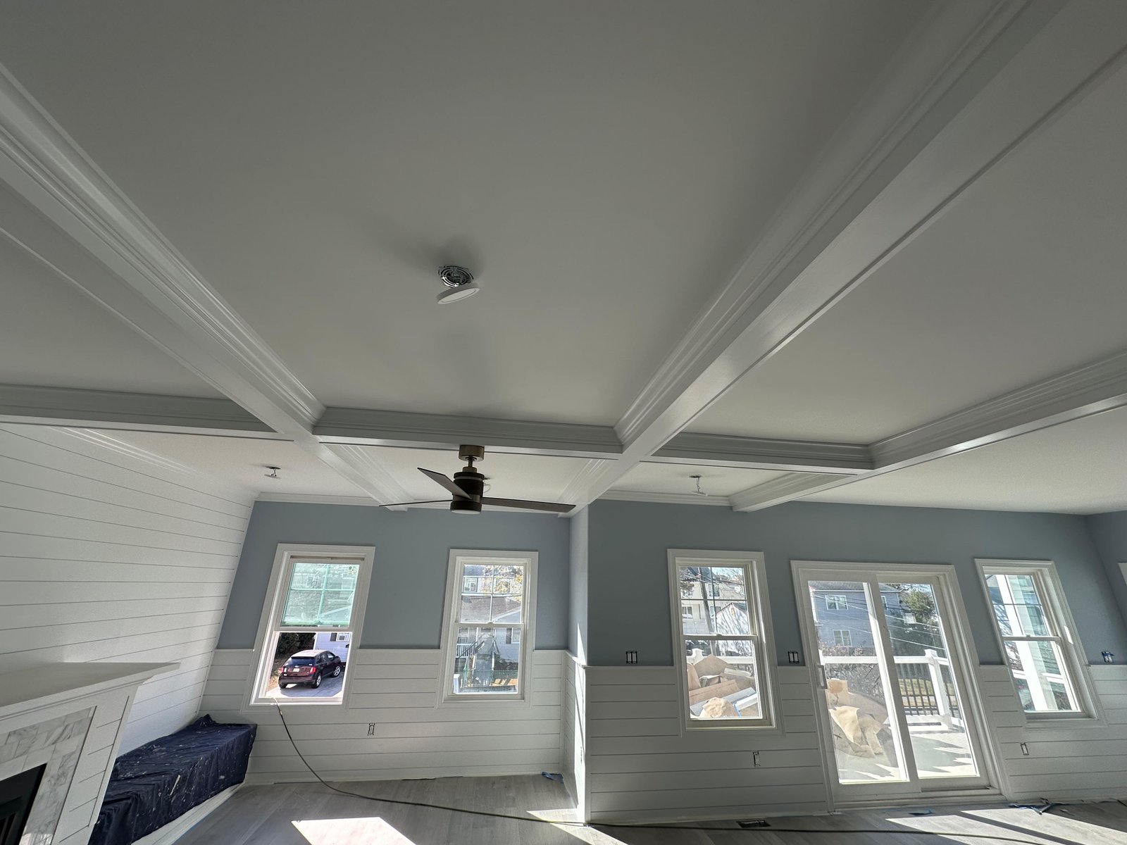 Completed coffered ceiling and shiplap finish carpentry