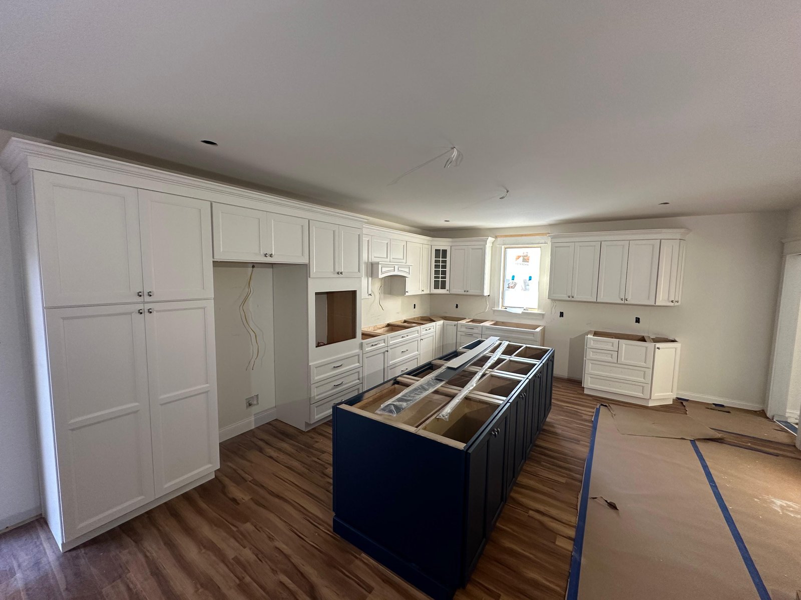 Kitchen cabinetry installation in progress