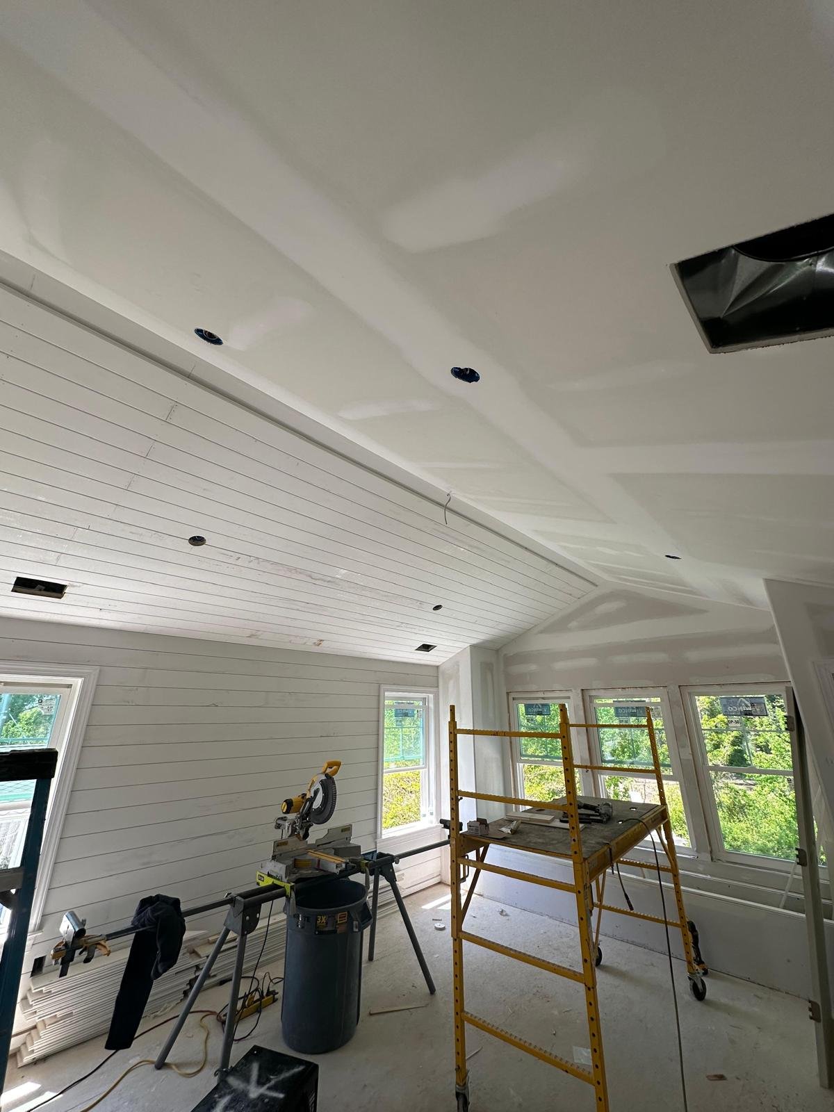 Shiplap ceiling installation in progress