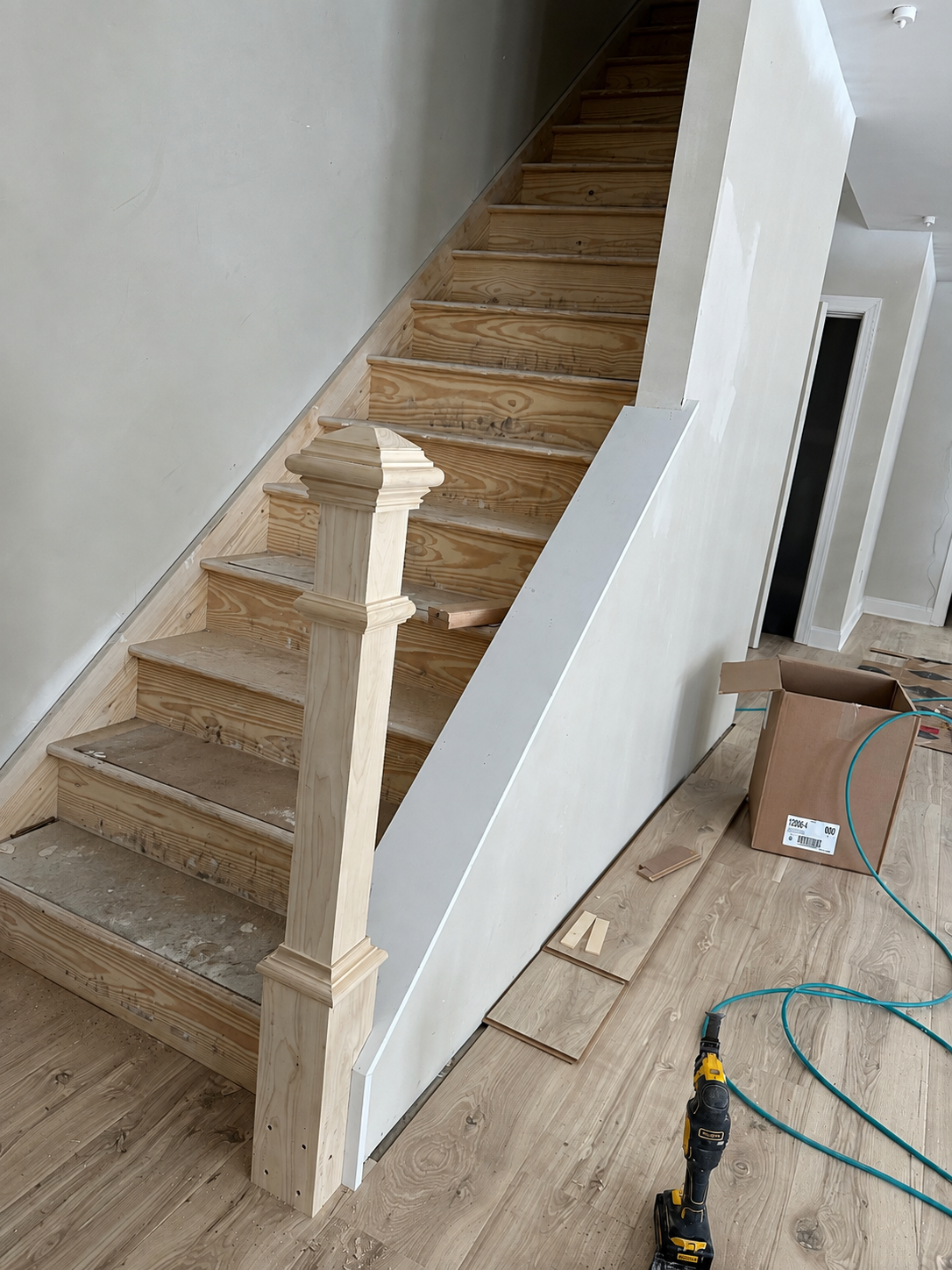 Staircase and railing installation in progress