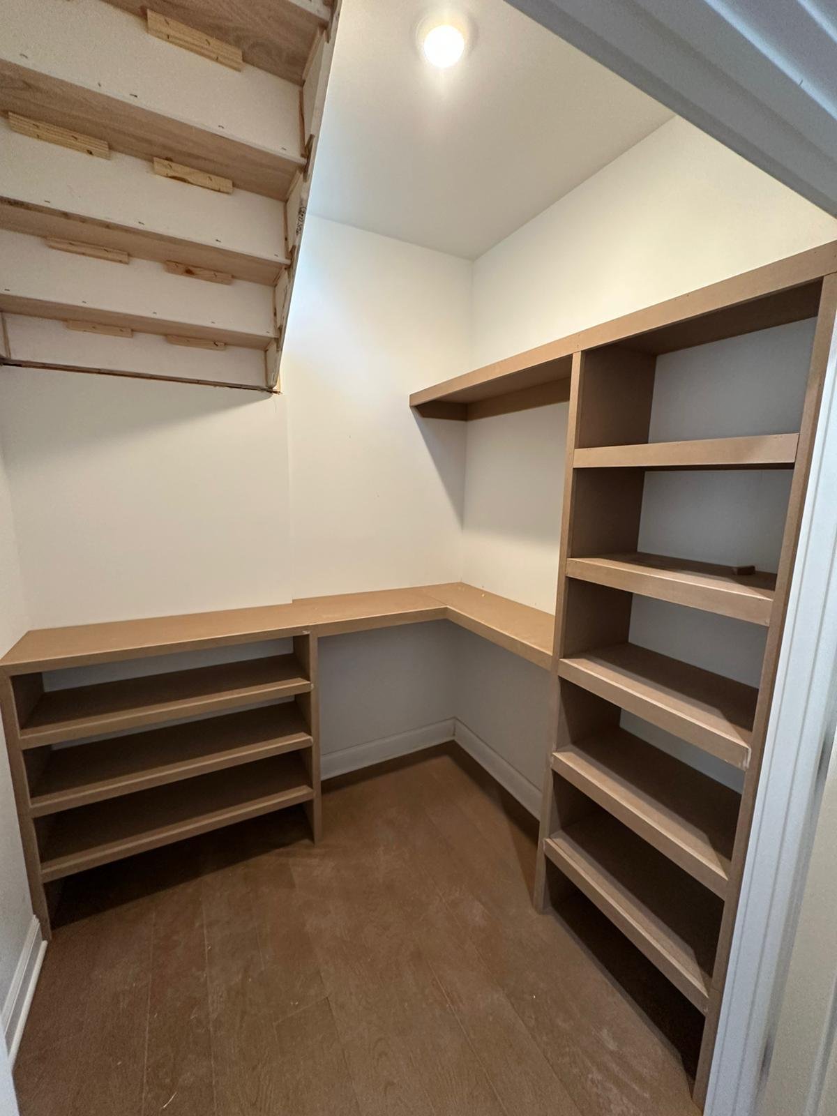 Walk-in closet shelving during installation